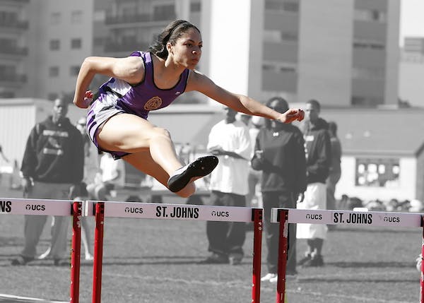 importance of b vitamins for sport nutrition woman taking part in hurdles